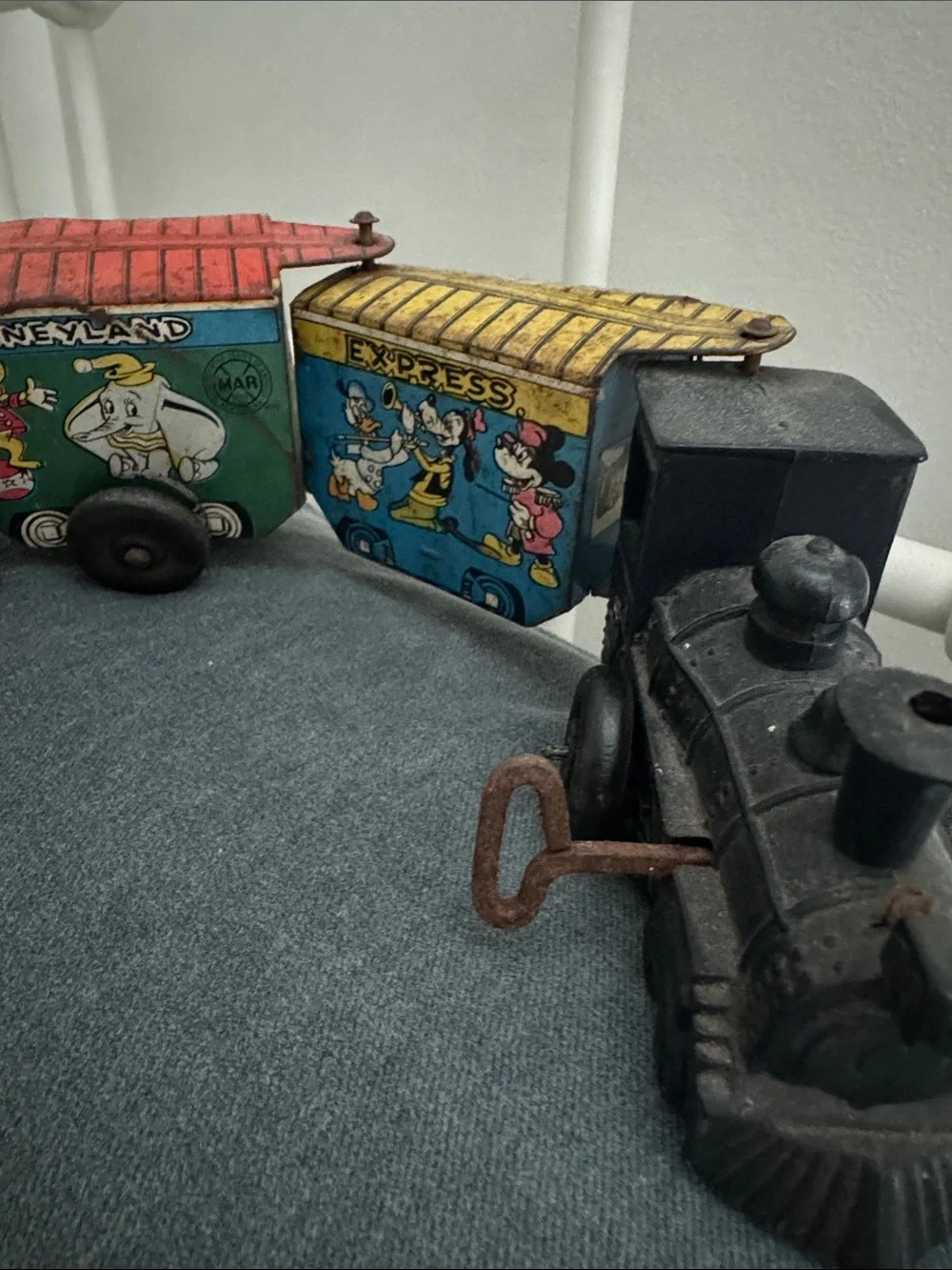 Disney Casey Jr. Toy Train with Yellow, Blue, Red and Black Cars1950s